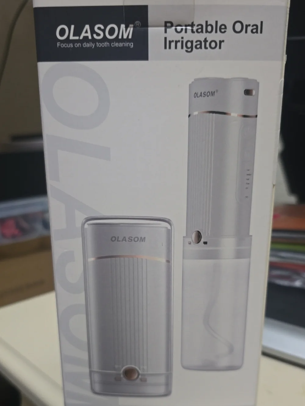 Olasom. Portable Oral Irrigator in White